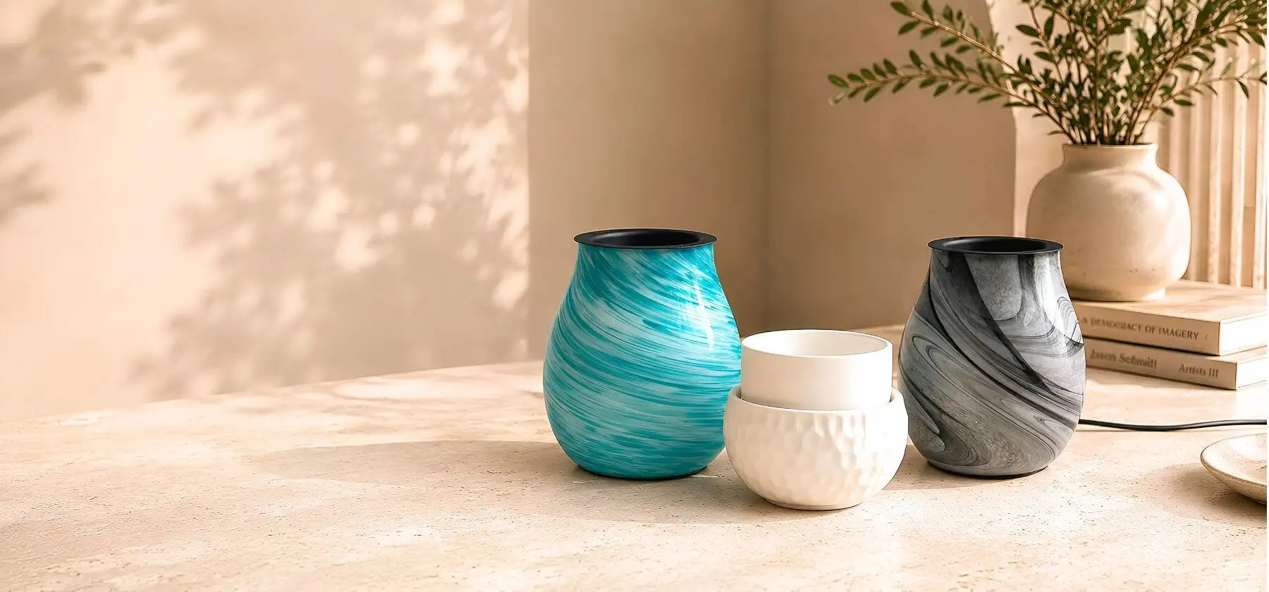 A turquoise and white marbled ceramic vase with a sleek, modern design.