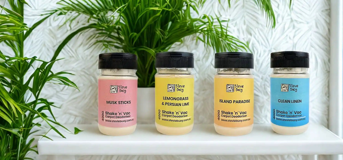 Four carpet deodorizer shakers in different scents.